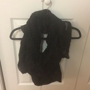Black infinity scarf with gold glitter.